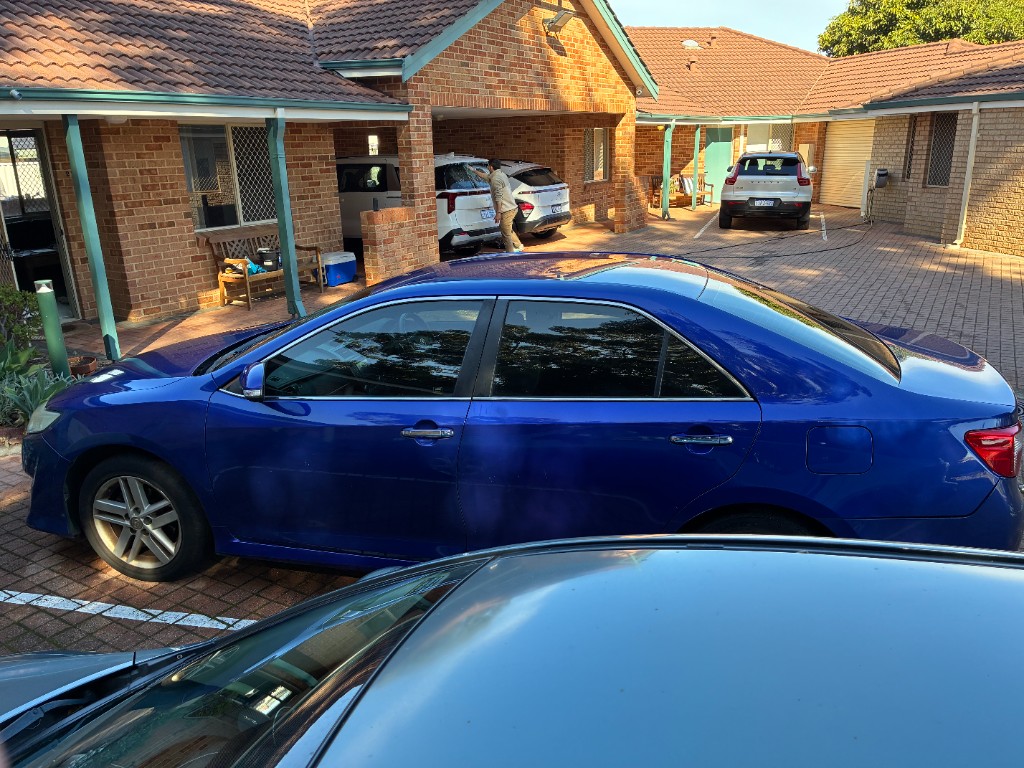 2012 Toyota Camry Atara S in blue — side profile